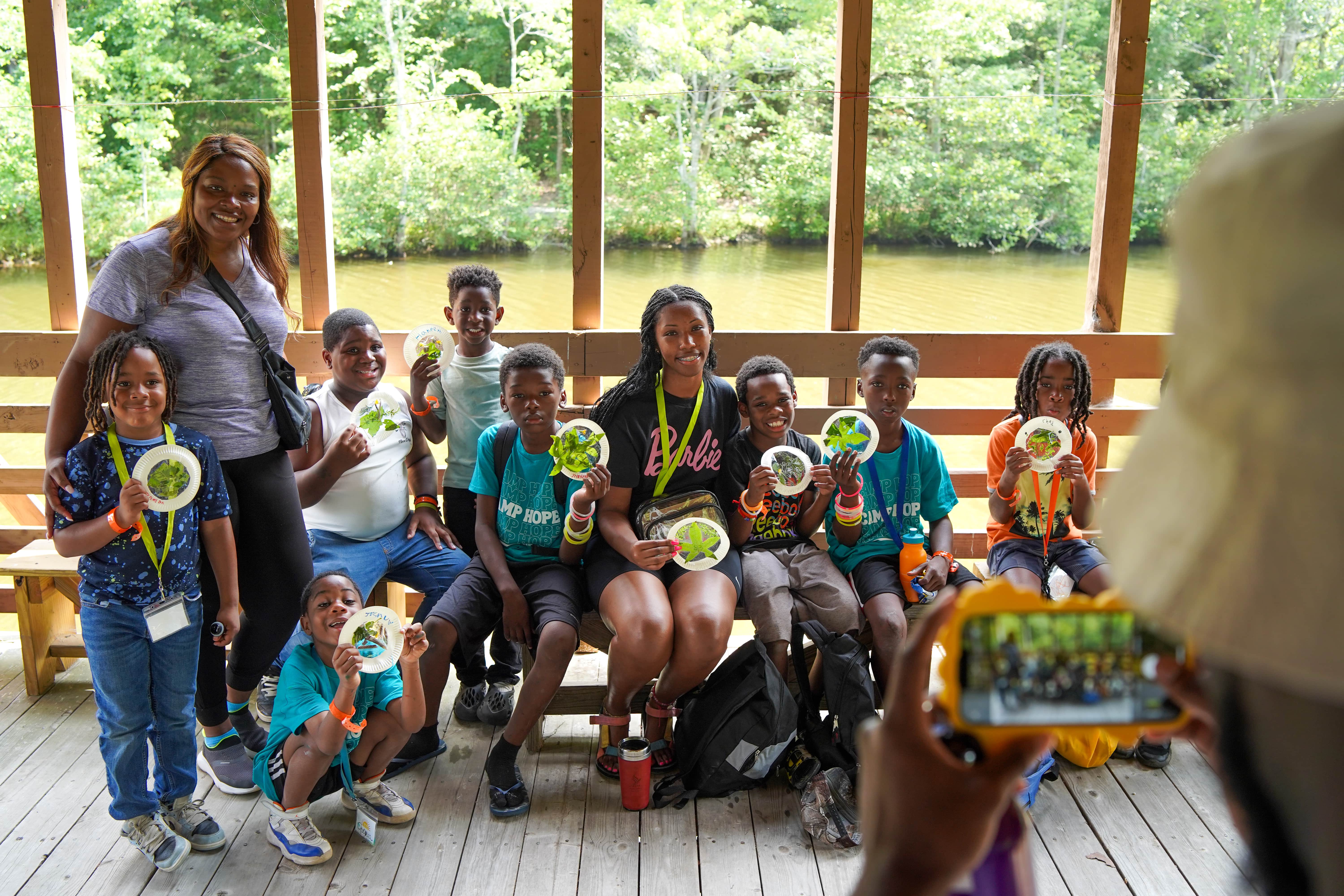 DA Howard with students and nature art at Camp Hope of Central Georgia